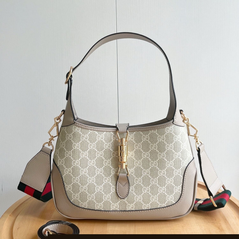G*u*i top handle bags